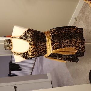Wore once costume! Cave girl halter mini dress. Cheetah print